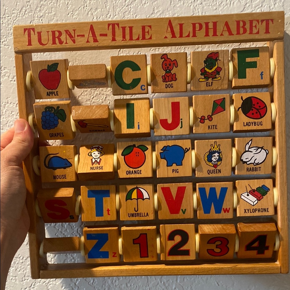 Turn-A-Tile alphabet toy